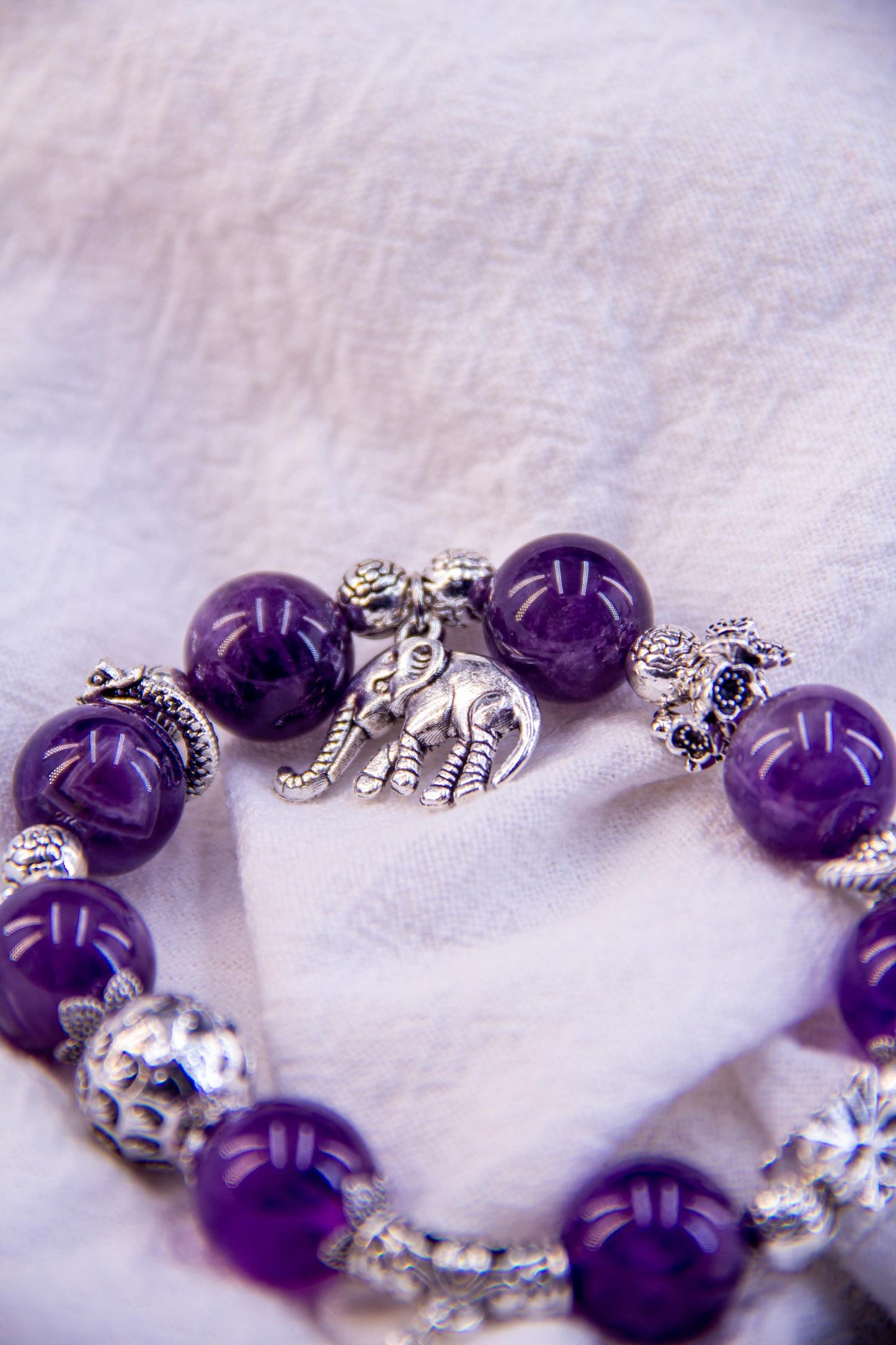 Amethyst Charm Bracelet - A Blend of Elegance and Symbolism