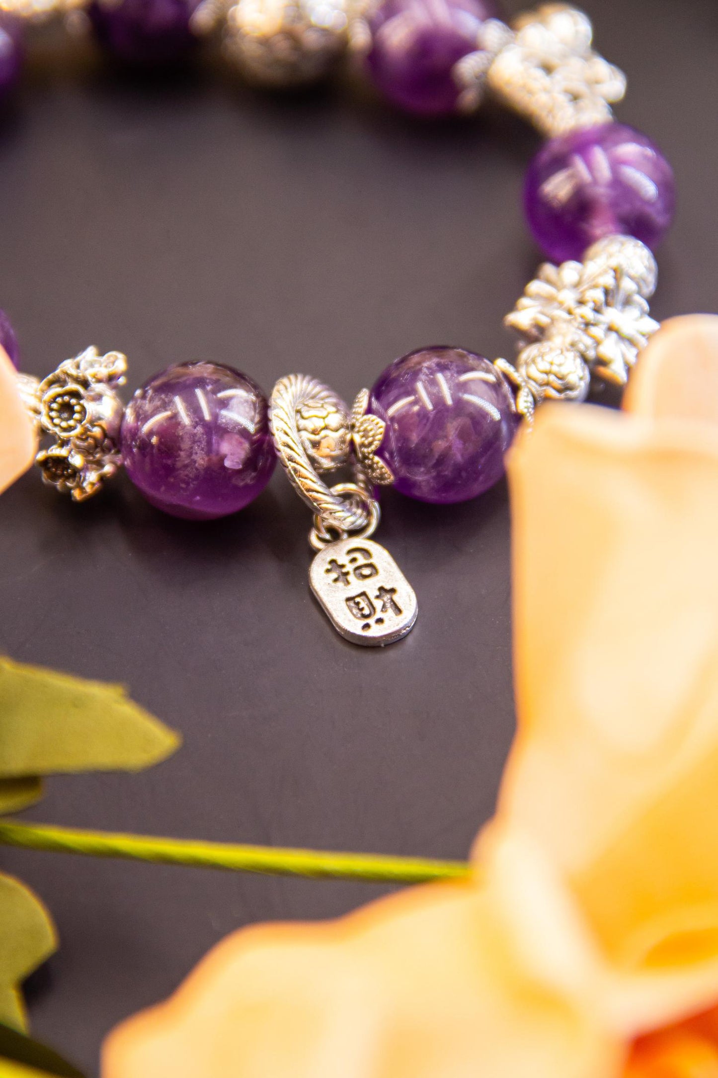Amethyst Charm Bracelet - A Blend of Elegance and Symbolism
