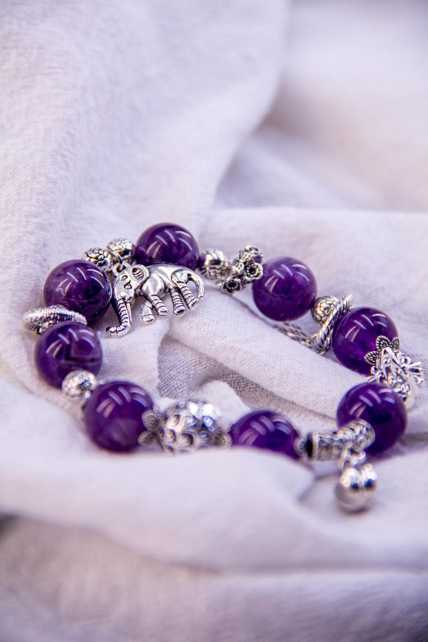 Amethyst Charm Bracelet - A Blend of Elegance and Symbolism